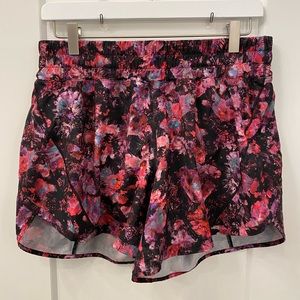 Lululemon Track That Short 5” Mid-Rise Size 10, Pink Multi Pattern.